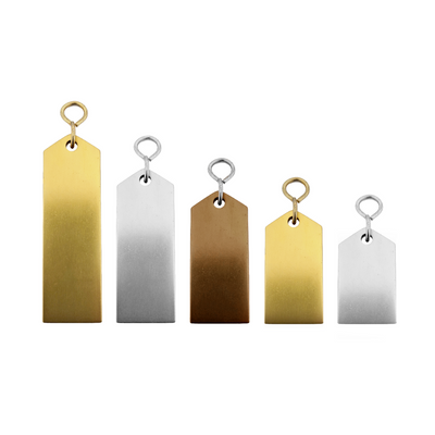 Five metal tags in gold, silver, and bronze on a white background