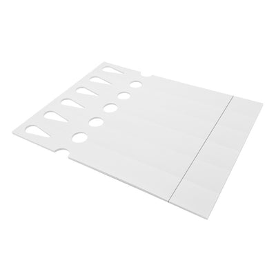 A stack of perforated label sheets, ready for use