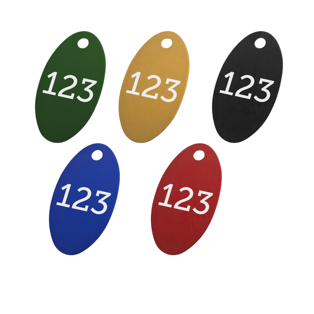 Five aluminium oval numbered tags 40x24mm in green, gold, black, blue, and red, each printed with the white numbers 123. One mounting hole at the top. 