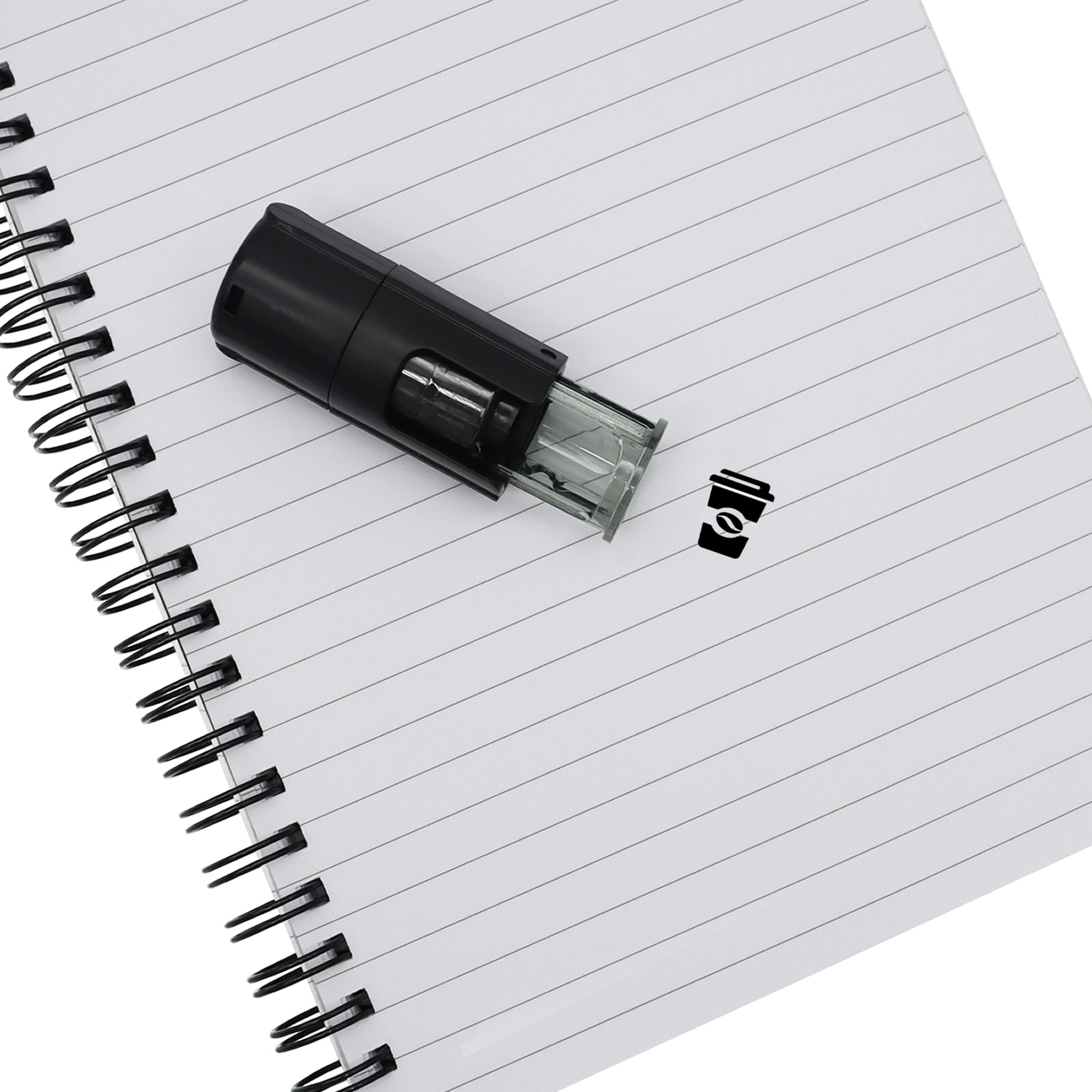 Self Inking Stamp Laying Flat On Note Pad With Coffee Take Away Cup Print