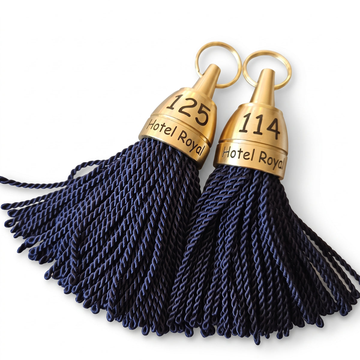 Example Image Of The Gold Brass Key Tags With Fabric Tassel and Engraving Comic Sans Font 