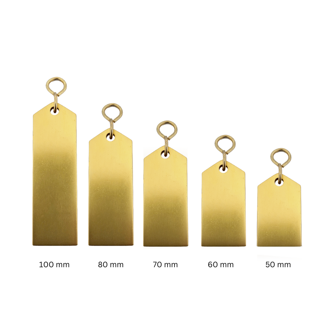 Set of five gold aluminium metal tags with varying sizes on a white background