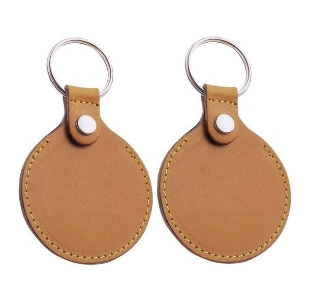 Round Leather Hotel Key Tags With a Hidden Coin Pocket | 95x58mm | With Hot Stamped Engraving